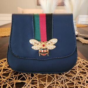 Elegant Navy Blue Designer Bag with Gold Bee Accent
